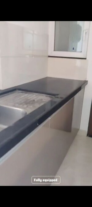 Kitchen in 3 BHK Apartment at Gera World of Joy, Kharadi – for Rent
