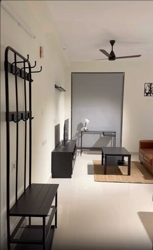 Living Room in 1 RK Apartment at Brigade Cornerstone Utopia, Varthur – for Rent