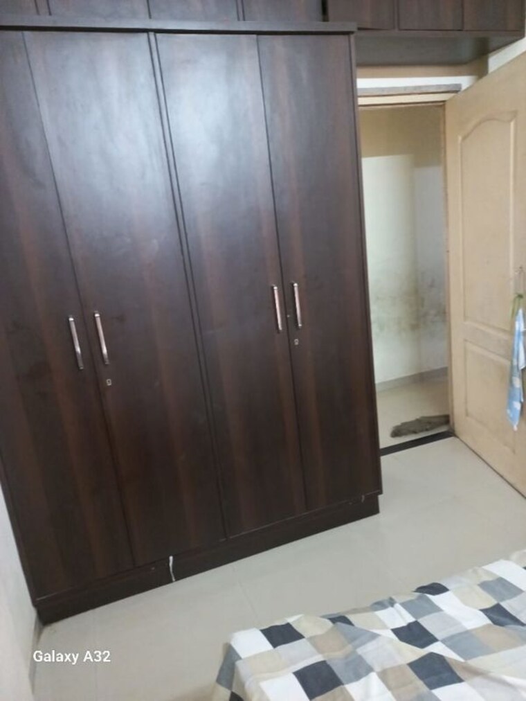 Room, cosmos-lounge 1 Bedroom 415 Sq.Ft. Apartment In Manpada Thane 10536855