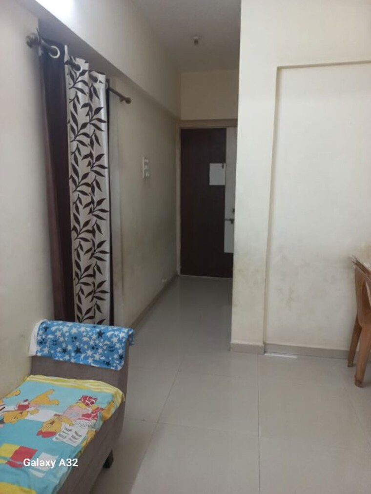 Room, cosmos-lounge 1 Bedroom 415 Sq.Ft. Apartment In Manpada Thane 10536855