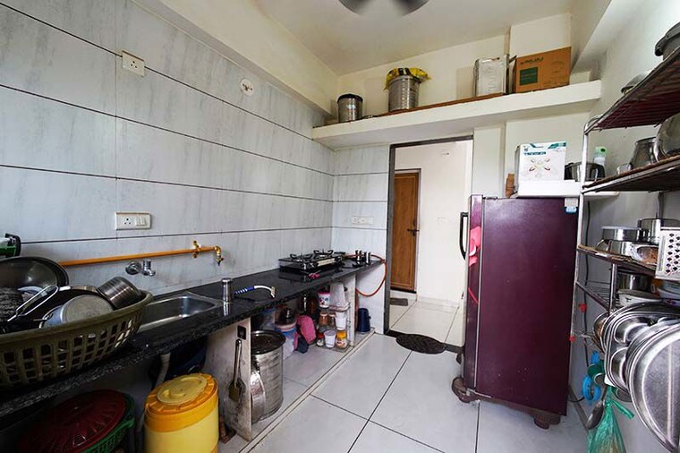 Kitchen, shree-prayosha-residency 2 Bedroom 190 Sq.Yd. Apartment In Vinzol Ahmedabad 10536870