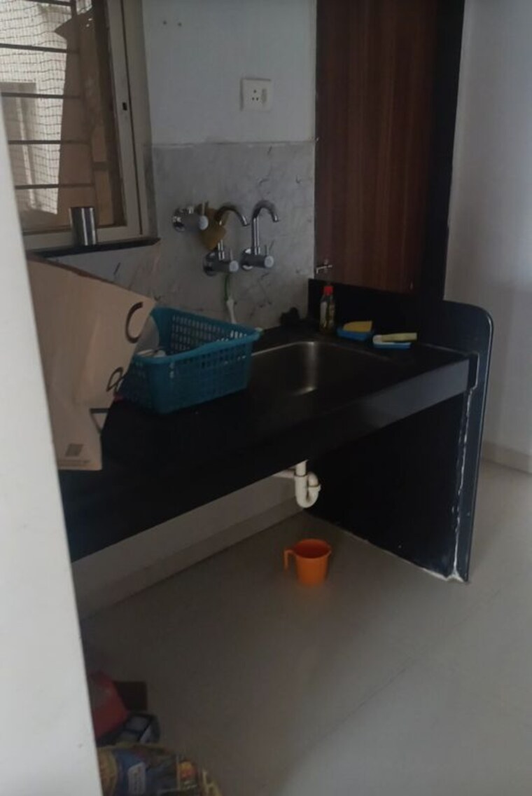 Kitchen, sterling-blooms 2 Bedroom 710 Sq.Ft. Apartment In Rahatani Pune 10523998