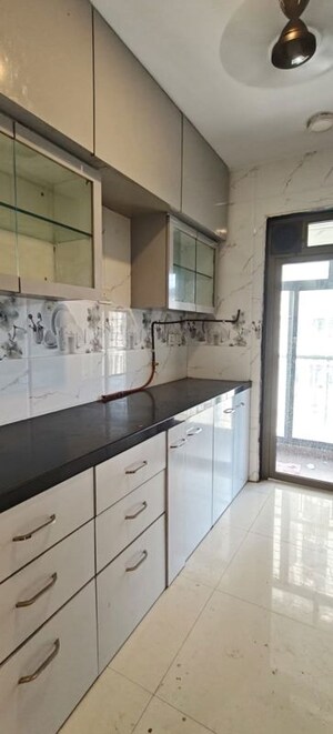 Kitchen in 2 BHK Apartment at Lodha Splendora, Ghodbunder Road – for Rent