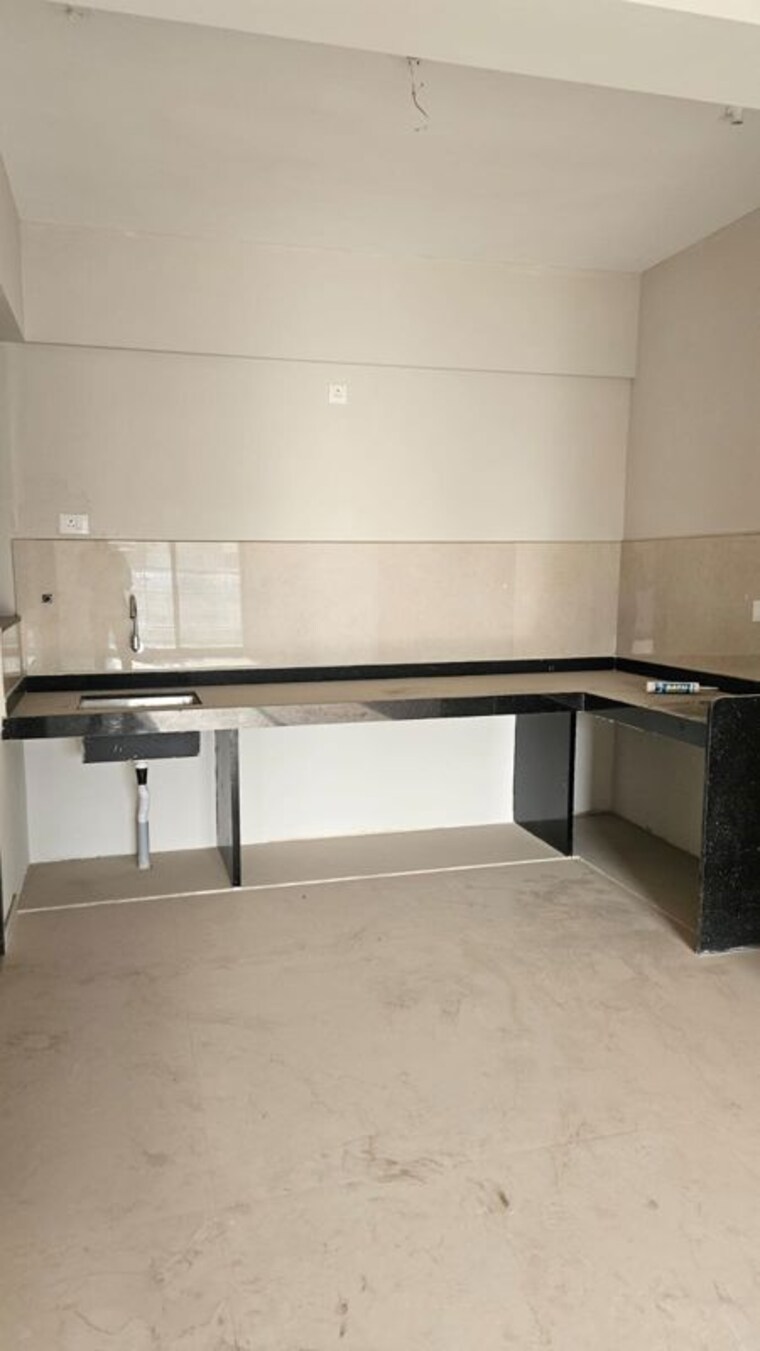 Kitchen, bhojwani-hi-face 1 Bedroom 650 Sq.Ft. Apartment In Pimple Saudagar Pune 10536947