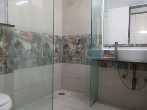 Bathroom in 3 BHK Apartment at Gaur Sportswood, Sector 79 – for Rent