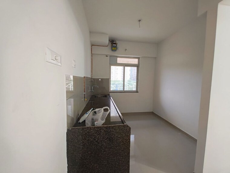 Kitchen, metropolis-bayside 1 Bedroom 370 Sq.Ft. Apartment In Kasarvadavali Thane 10536991