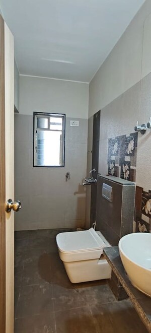 Bathroom in 1 BHK Apartment at Jangid Galaxy, Ghodbunder Road – for Rent