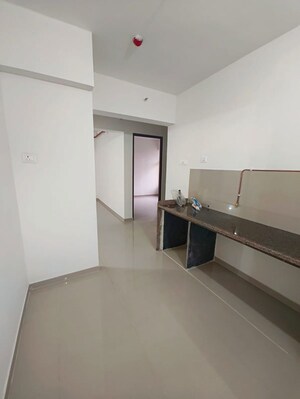 Kitchen in 2 BHK Apartment at Godrej Emerald, Ghodbunder Road – for Rent