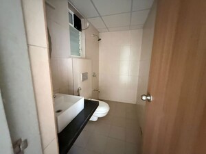 Bathroom in 2 BHK Apartment at Godrej Emerald, Ghodbunder Road – for Rent