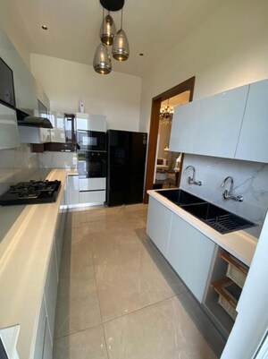 Kitchen in 3 BHK Builder Floor at Puri Vip Floors, Sector 81 – for Rent