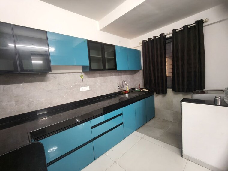 Kitchen, legacy-ilife 2 Bedroom 1100 Sq.Ft. Apartment In Nibm Pune 10490931