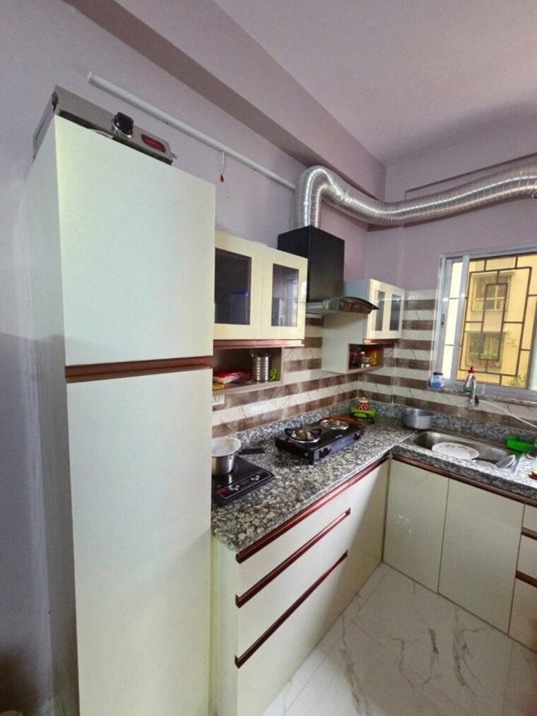 Kitchen, new town 3 Bedroom 1430 Sq.Ft. Apartment In New Town Kolkata 10537177