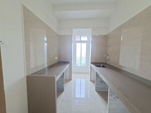 Kitchen in 2 BHK Apartment at Dosti Tulip, Balkum Pada – for Rent