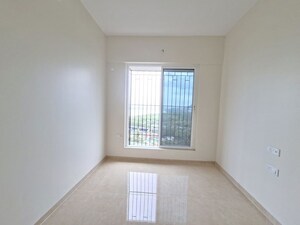 Bedroom in 2 BHK Apartment at Dosti Tulip, Balkum Pada – for Rent