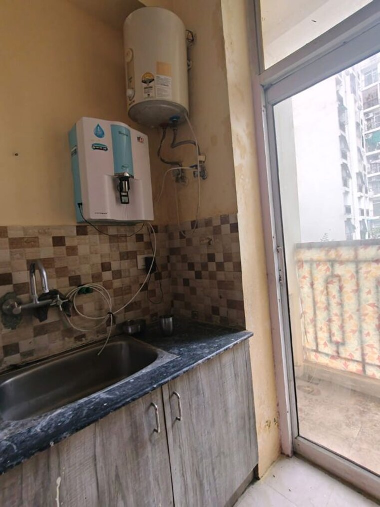 Kitchen, ansal-api-celebrity-garden-block-j 2 Bedroom 1315 Sq.Ft. Apartment In Sushant Golf City Lucknow 10537214