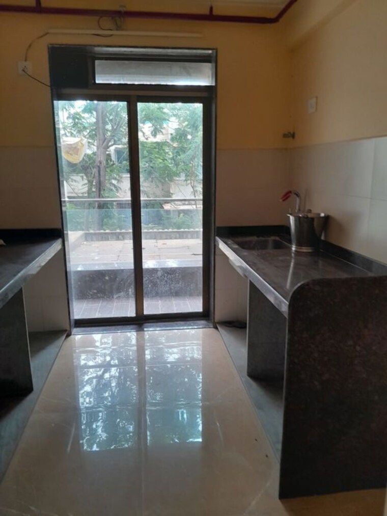 Kitchen, triumph-siddhivinayak-chs 2 Bedroom 838 Sq.Ft. Apartment In Borivali East Mumbai 10537340