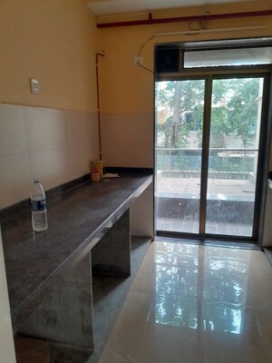 Kitchen in 2 BHK Apartment at Triumph Siddhivinayak CHS, Borivali East – for Sale