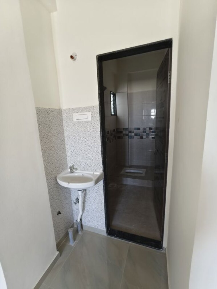Bathroom, rr-lunkad-66-avenue 2 Bedroom 1000 Sq.Ft. Apartment In Pimple Nilakh Pune 10537378