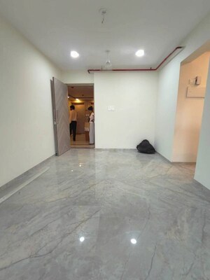 Room in 1 BHK Apartment at Ajmera Boulevard, Malad West – for Rent