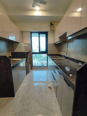 Kitchen in 1 BHK Apartment at Ajmera Boulevard, Malad West – for Rent