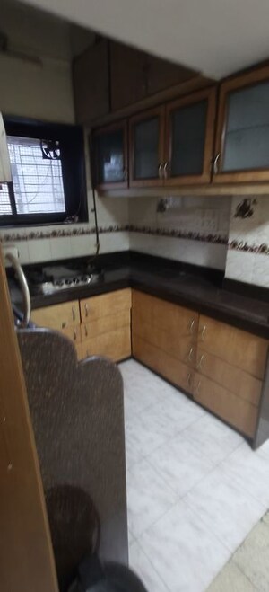 Kitchen in 2 BHK Apartment at Oshiwara Mhada, Andheri West – for Rent