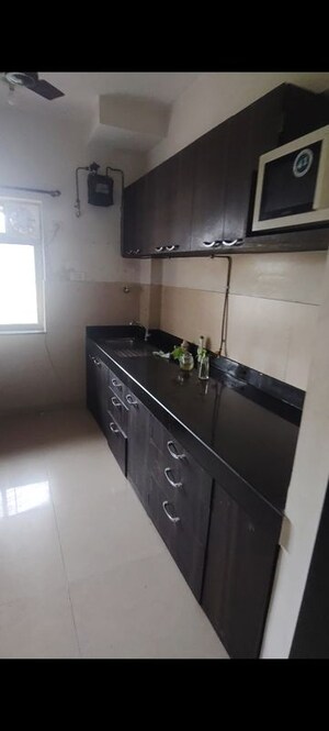 Kitchen in 2 BHK Apartment at Kalpataru Hills, Manpada – for Rent