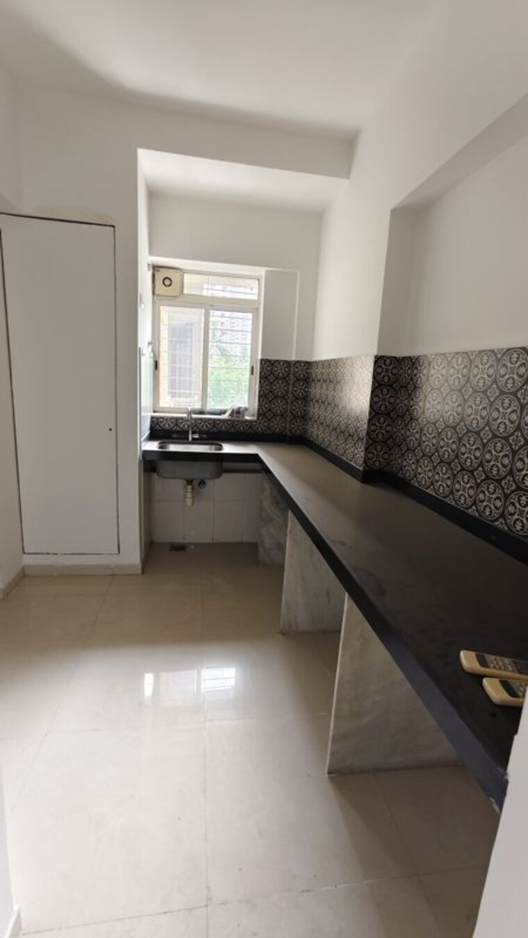 Kitchen, lodha-amara 2 Bedroom 630 Sq.Ft. Apartment In Kolshet Road Thane 10537536