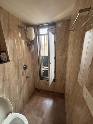 Bathroom in 2 BHK Apartment at Lodha Amara, Kolshet Road – for Rent