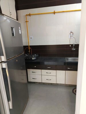 Kitchen in 2 BHK Apartment at Titanium City Centre, Satellite – for Rent