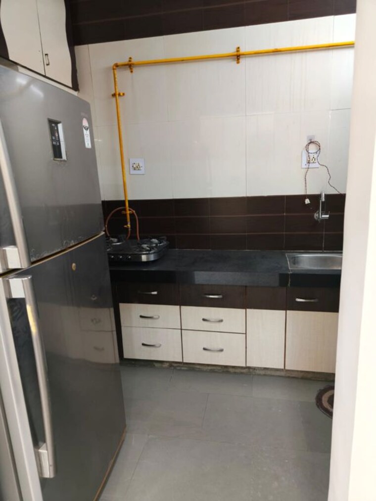 Kitchen, titanium-city-centre 2 Bedroom 1250 Sq.Ft. Apartment In Satellite Ahmedabad 10537704