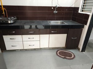 Kitchen in 2 BHK Apartment at Titanium City Centre, Satellite – for Rent