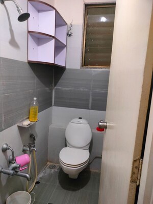 Bathroom in 2 BHK Apartment at Krupal Heritage, Prahlad Nagar – for Rent