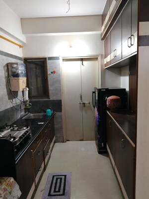 Kitchen in 2 BHK Apartment at Krupal Heritage, Prahlad Nagar – for Rent