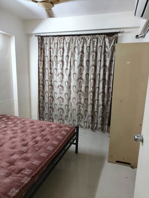 Bedroom in 2 BHK Apartment at Krupal Heritage, Prahlad Nagar – for Rent