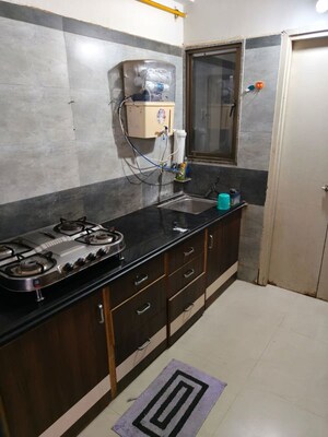 Kitchen in 2 BHK Apartment at Krupal Heritage, Prahlad Nagar – for Rent