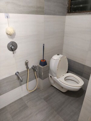 Bathroom in 2 BHK Apartment at Krupal Heritage, Prahlad Nagar – for Rent