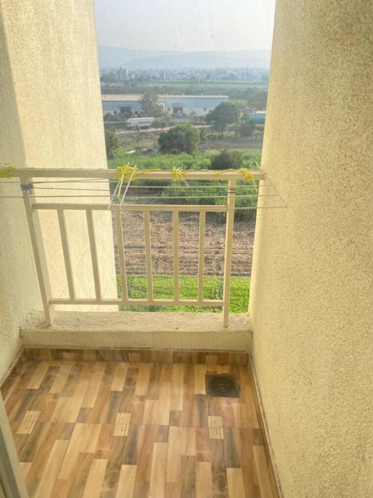 Balcony, majestique-nest-building-d 2 Bedroom 650 Sq.Ft. Apartment In Fursungi Pune 10537743