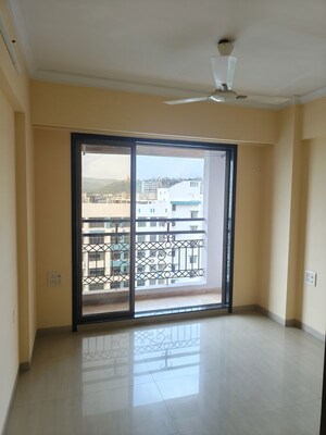 Room in 2 BHK Apartment at Ambika Heights, Nerul – for Rent