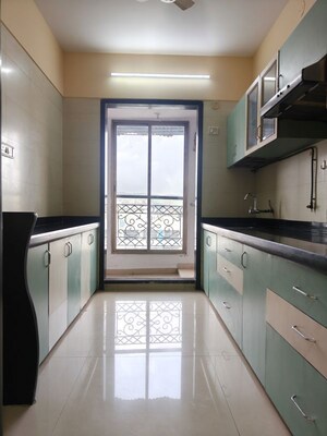 Kitchen in 2 BHK Apartment at Ambika Heights, Nerul – for Rent