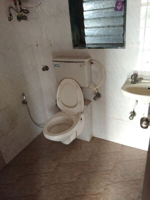 Bathroom in 2 BHK Apartment at Vjay Victory Heights, Borivali West – for Rent