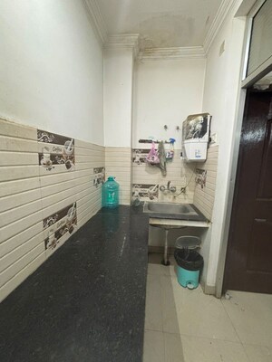 Kitchen in 2 BHK Apartment at Husainganj – for Rent