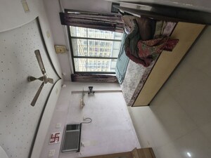 Master Bedroom in 2 BHK Apartment at Samved Madhukunj CHS, Borivali East – for Rent