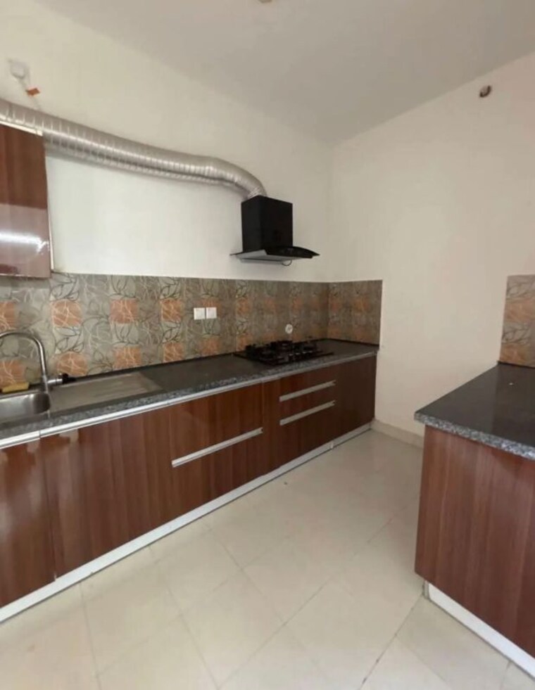 Kitchen, hero-homes-gurgaon 4 Bedroom 2450 Sq.Ft. Apartment In Sector 104 Gurgaon 10538147