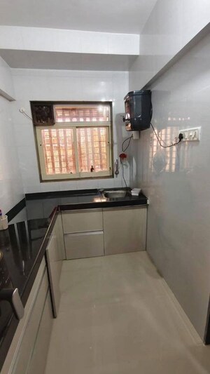 Kitchen in 1 BHK Apartment at Majiwada – for Sale