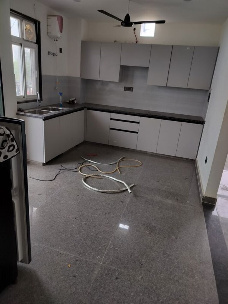 Kitchen, unitech-uniworld-resorts-the-residences 3 Bedroom 2000 Sq.Ft. Builder Floor In Sector 33 Gurgaon 10538309