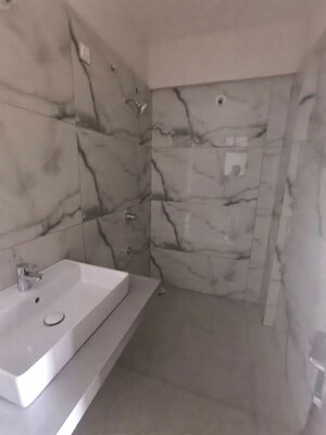 Bathroom in 4 BHK Apartment at Austin One, Pimple Saudagar – for Rent