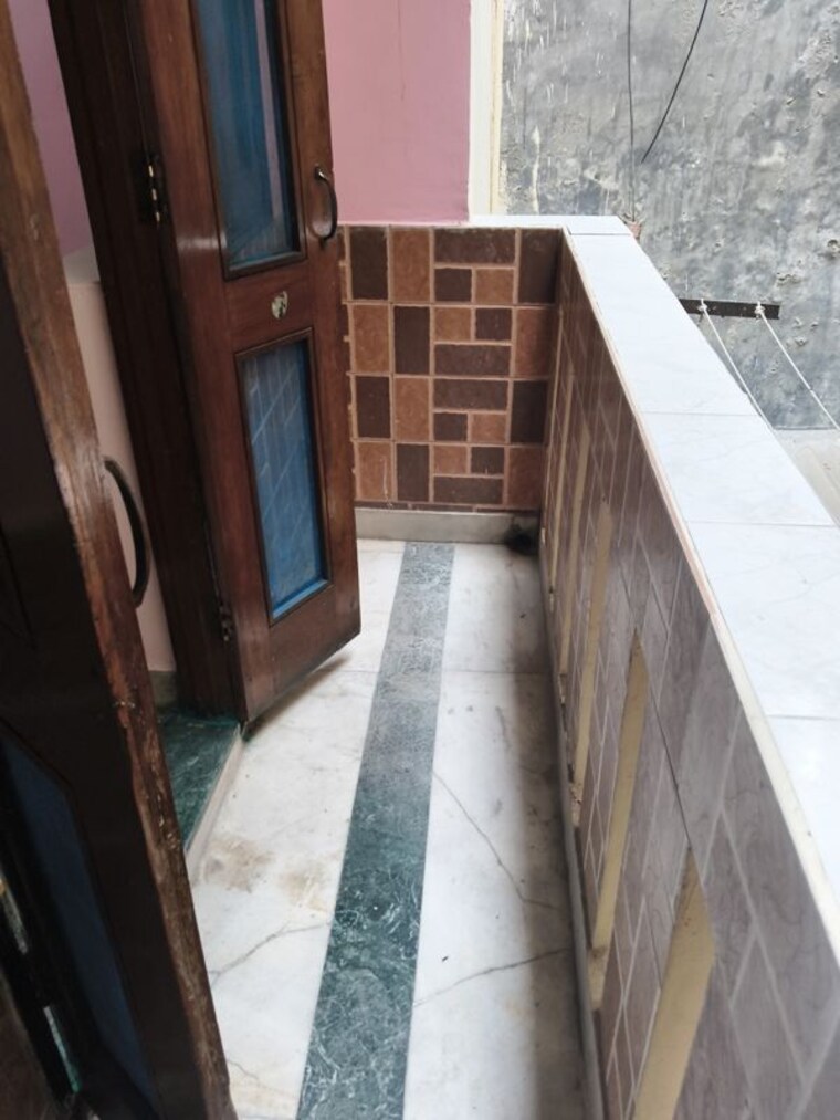 Balcony, rwa-apartments-sector-52 2 Bedroom 1000 Sq.Ft. Independent House In Sector 52 Noida 10538348
