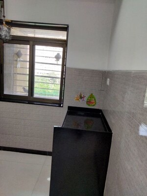 Kitchen in 3 BHK Apartment at Acme Ozone, Manpada – for Rent