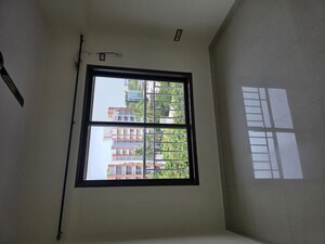 Room in 2 BHK Apartment at Rushi The Kollage, Andheri East – for Rent
