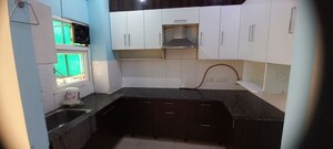 Kitchen in 2 BHK Apartment at JKG Palm Court, Sector 16c Greater Noida – for Rent